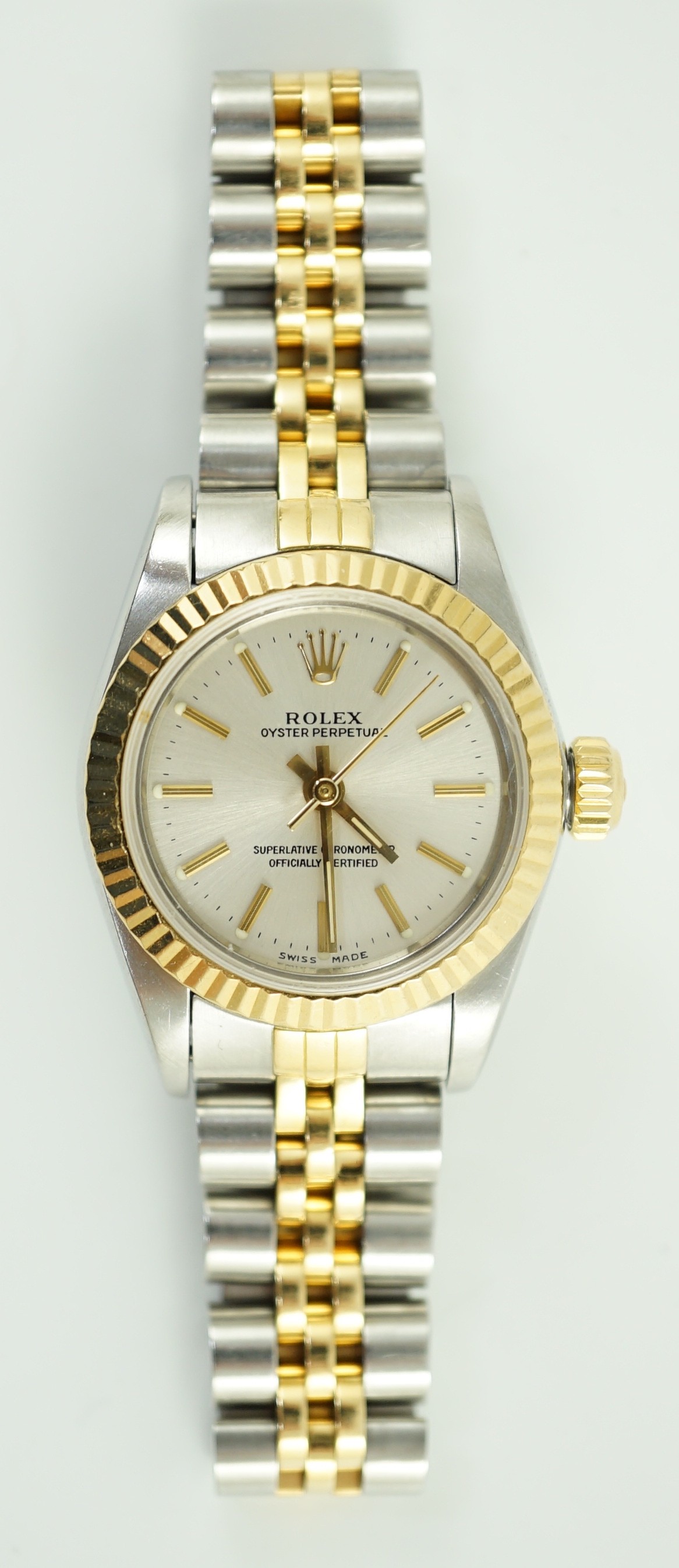 A lady's early 1990's steel and gold Rolex Oyster Perpetual wrist watch, on a steel and gold Rolex bracelet